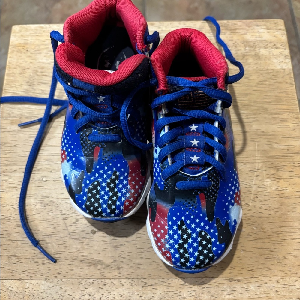 Under Armour Kids ball cleats Blue and Red with stars